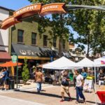 a group of people walking in a street