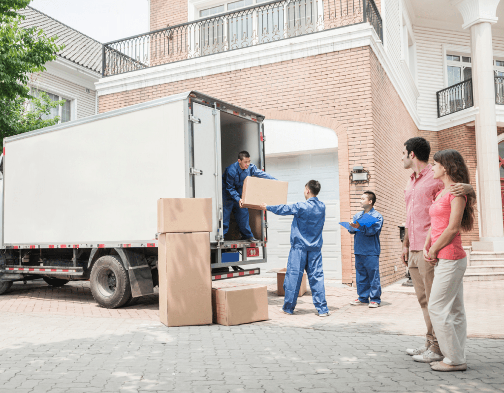 a group of people standing in front of a truck